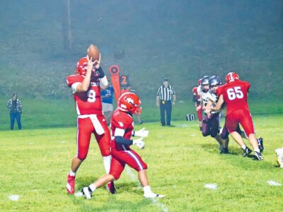 Titans Demolish Unaka on Both Sides in Record-Setting Day