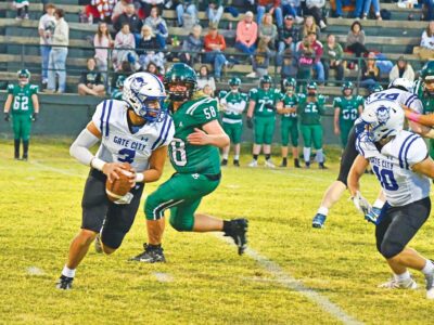 Blue Devils Torch Trojans for Bounce Back District Victory
